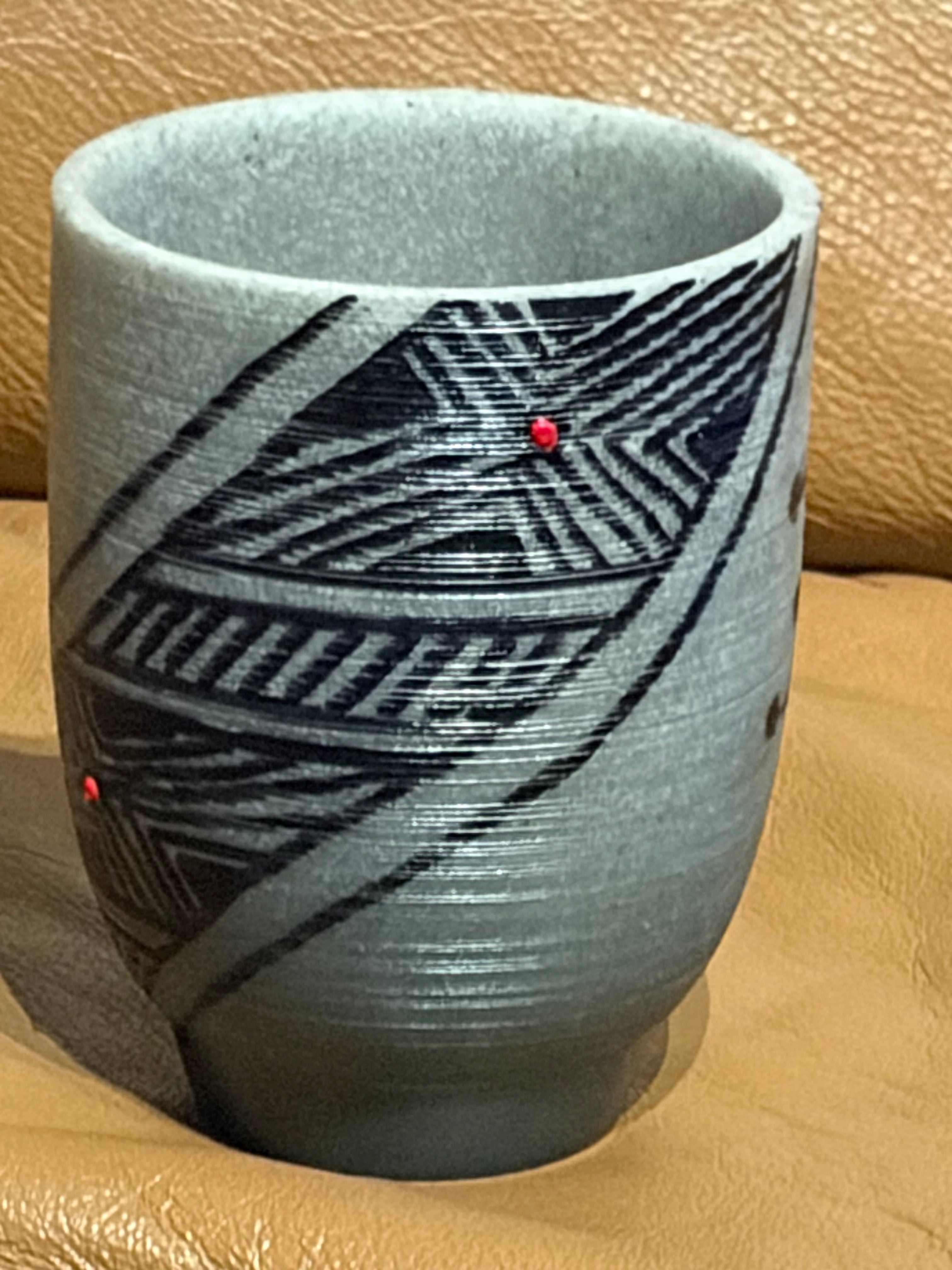 Blue Gray Cup with Designs and Red Dot