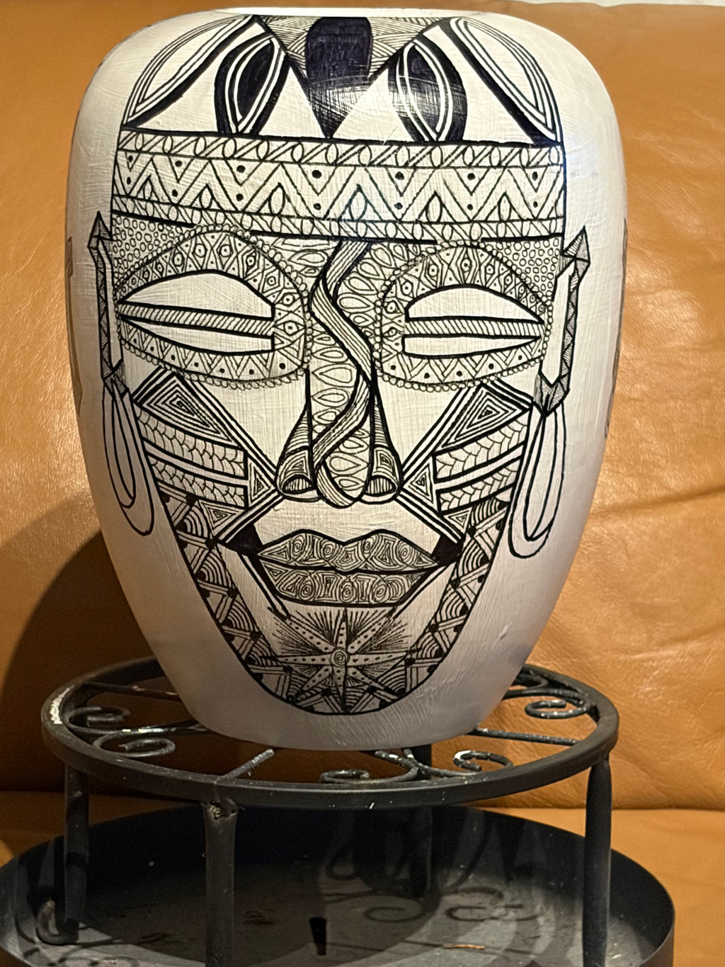 Large Vase with Four Masks