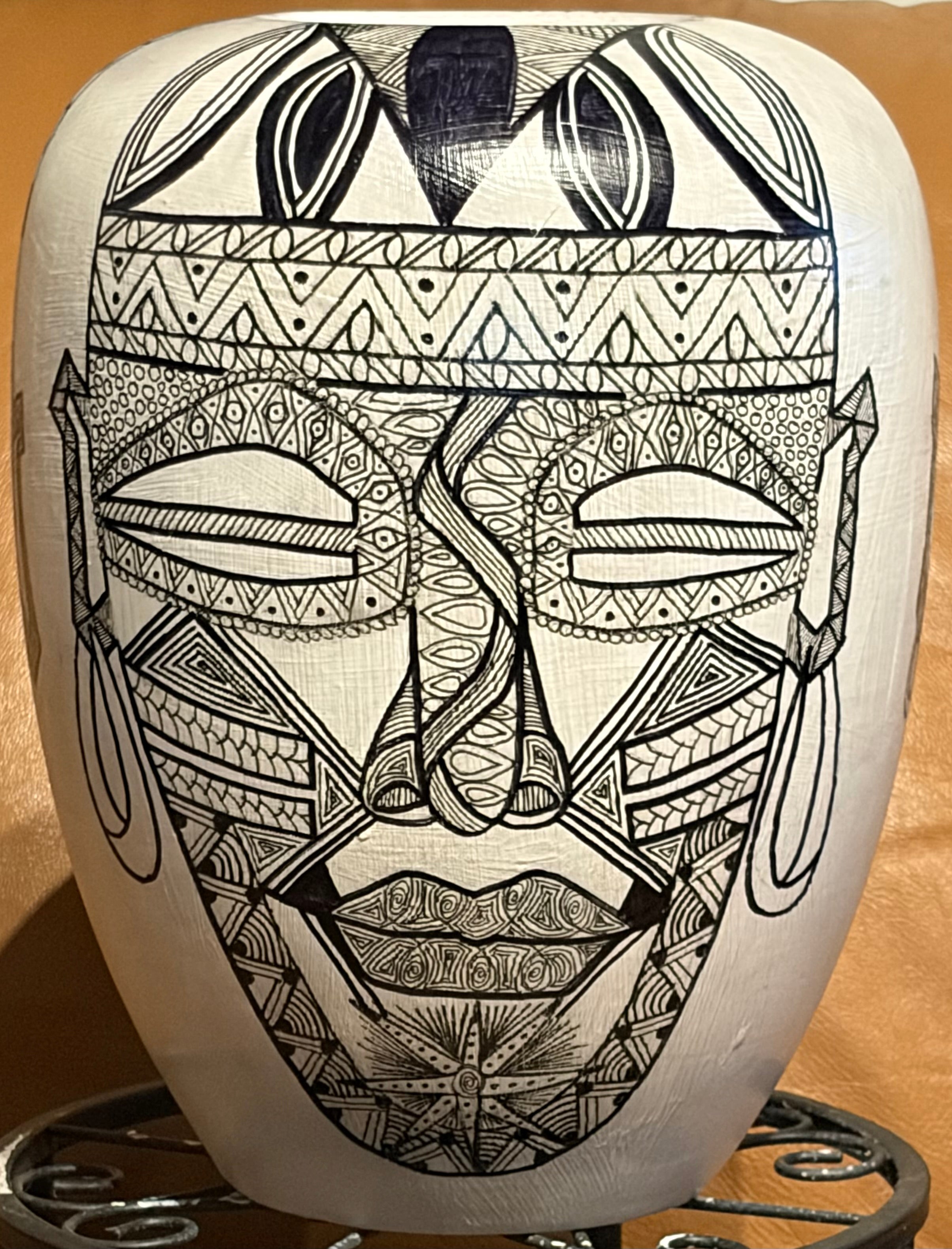 Large Vase with Four Masks