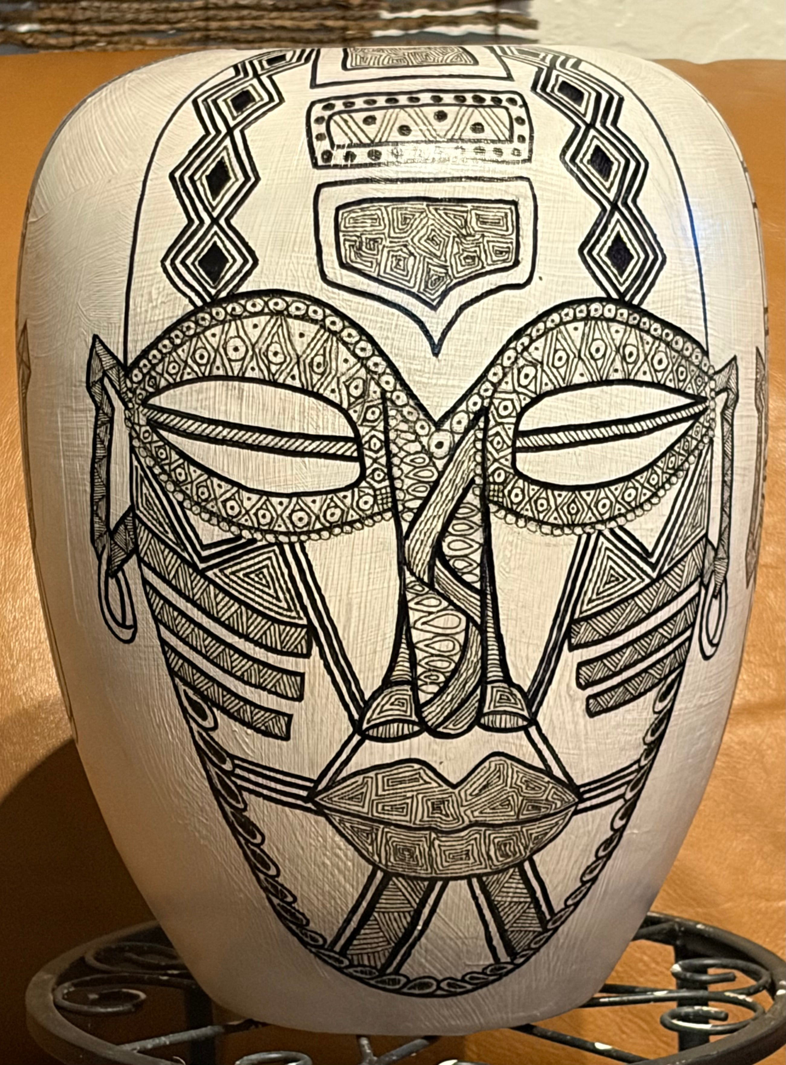 Large Vase with Four Masks