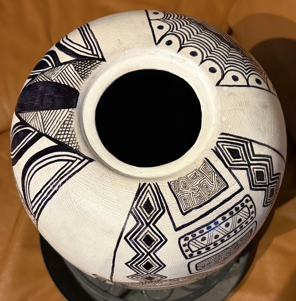 Large Vase with Four Masks