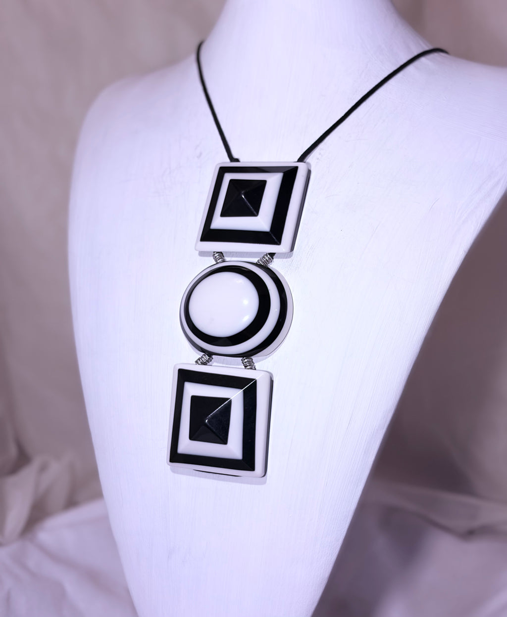 Black Squares and White Circle